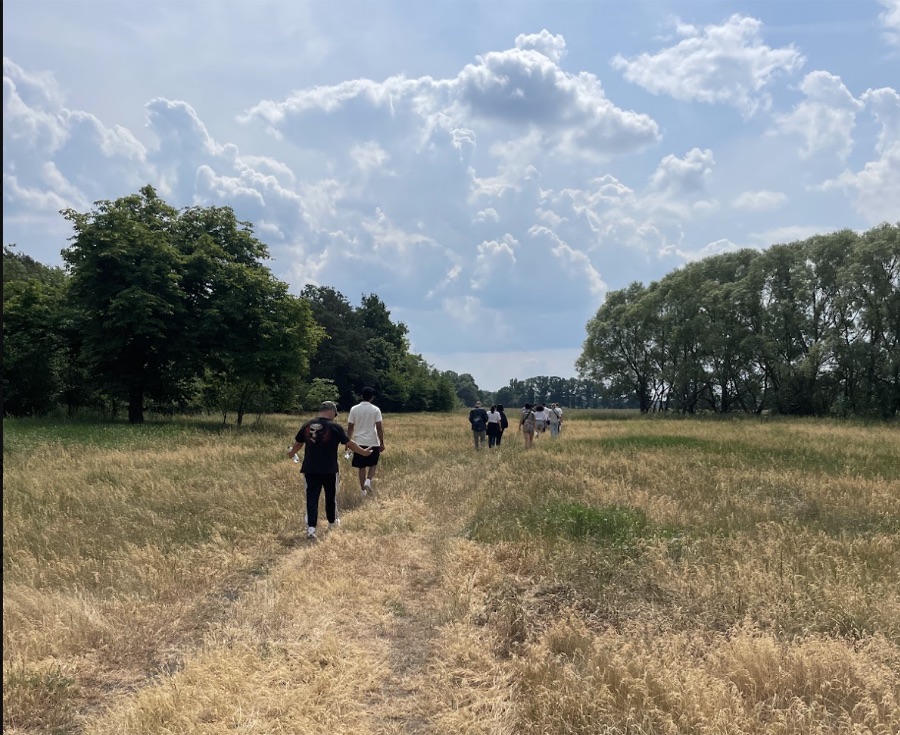 The team on a company walk through the fields